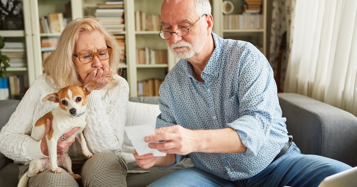 Elderly couple looking at their finances